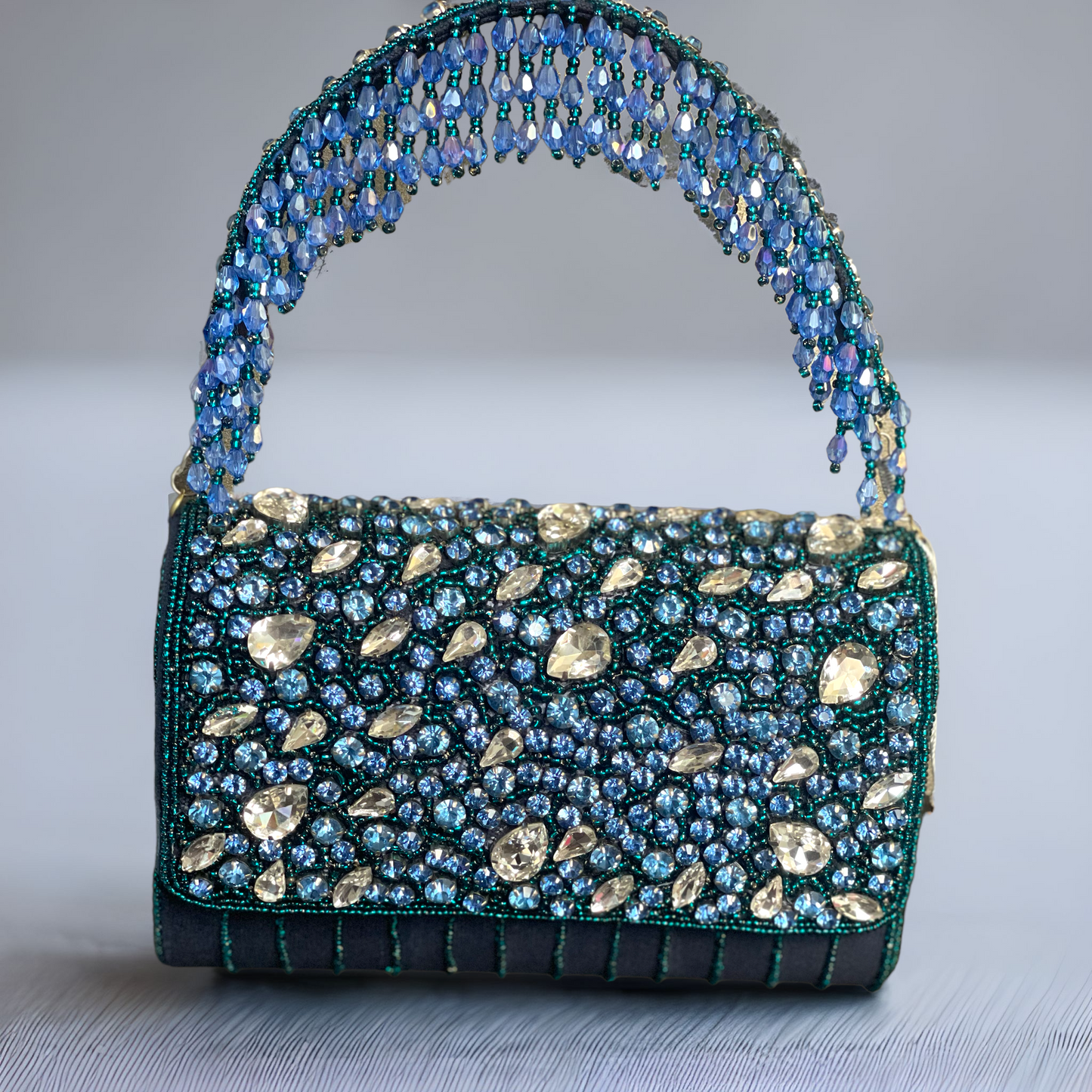 Sparkle Boldly. Carry Elegance